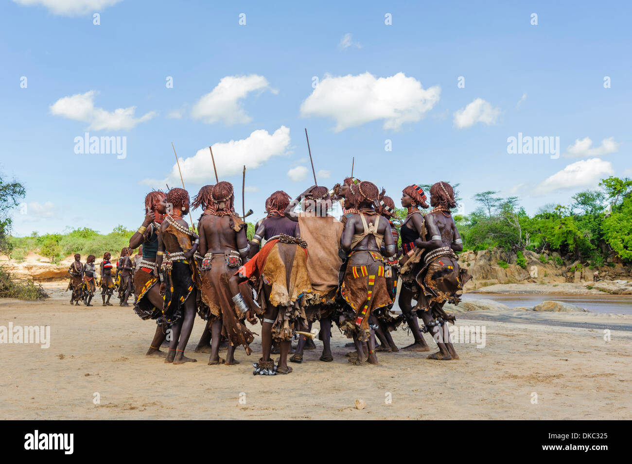 Women dancing during a bull jumping ceremony. A rite of passage from boys to men. Hamer tribe, Omo valley, Ethiopia Stock Photo