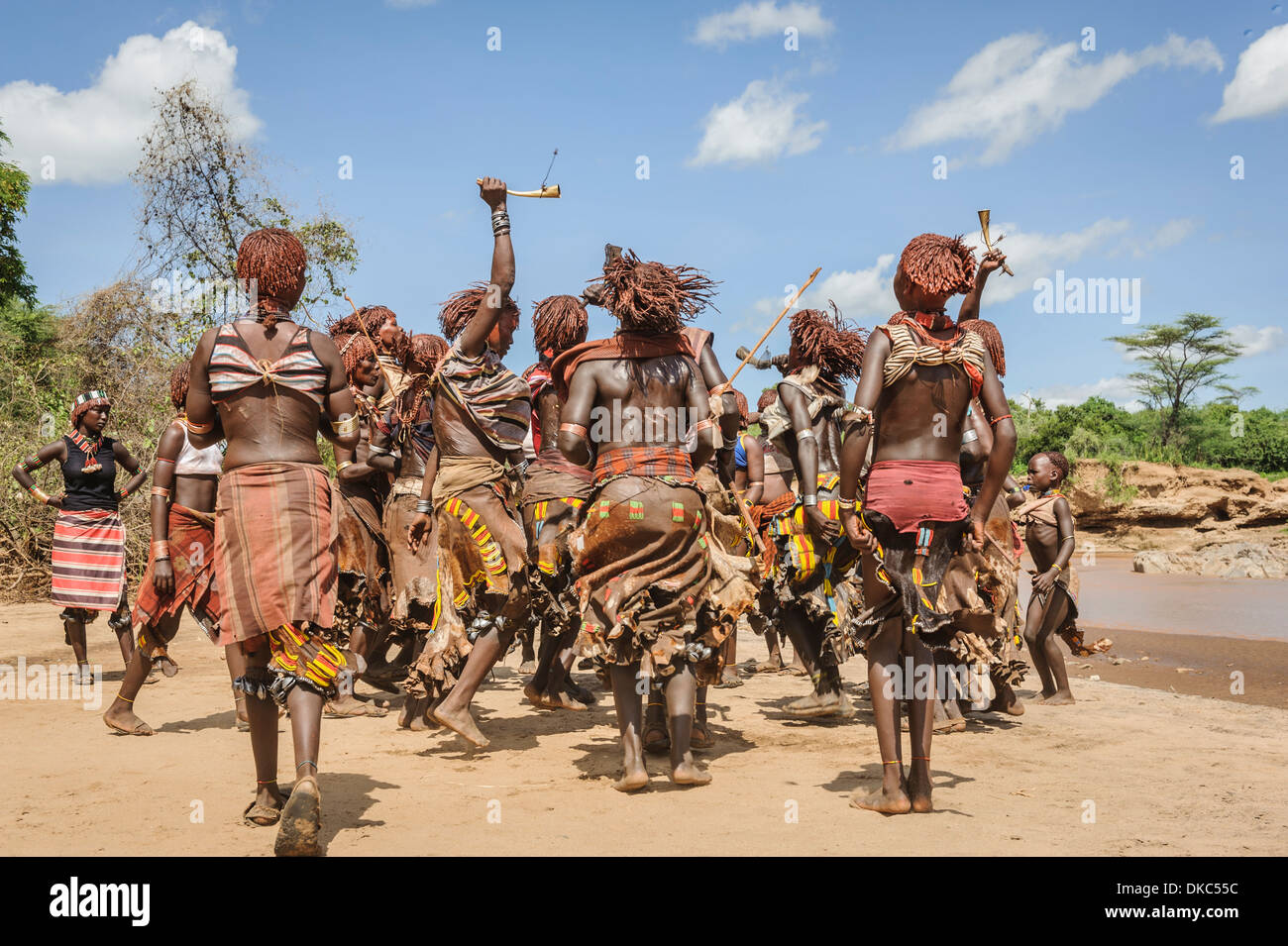 Women dancing during a bull jumping ceremony. A rite of passage from boys to men. Hamer tribe, Omo valley, Ethiopia Stock Photo