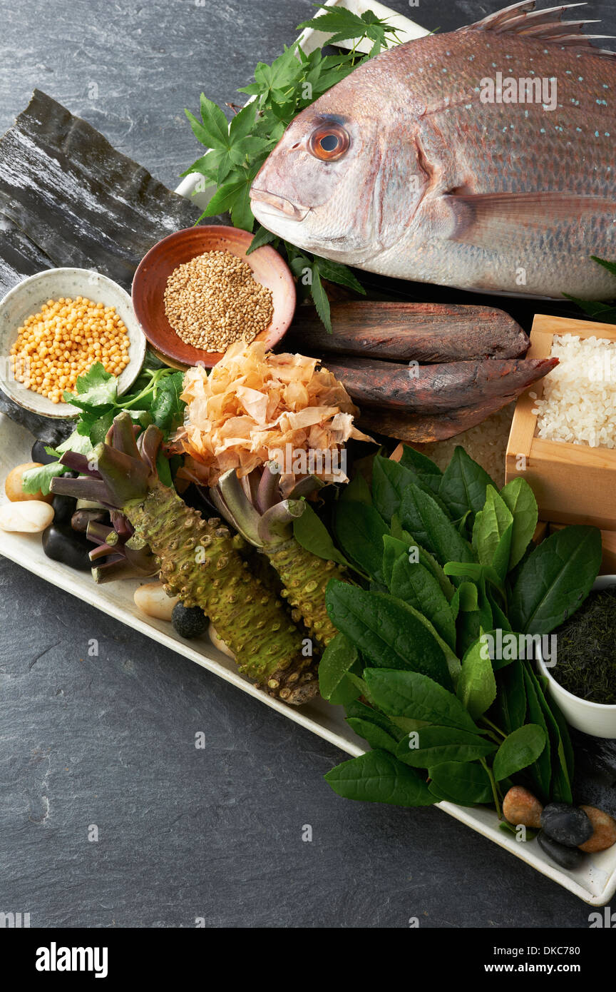 Platter of foods including fresh fish and vegetables Stock Photo Alamy