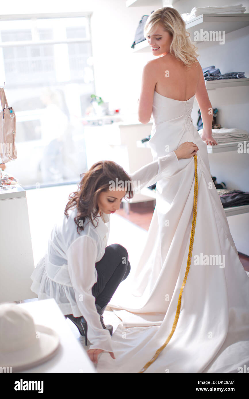 Woman Measuring Train Of Wedding Dress Stock Photo 63579564 Alamy