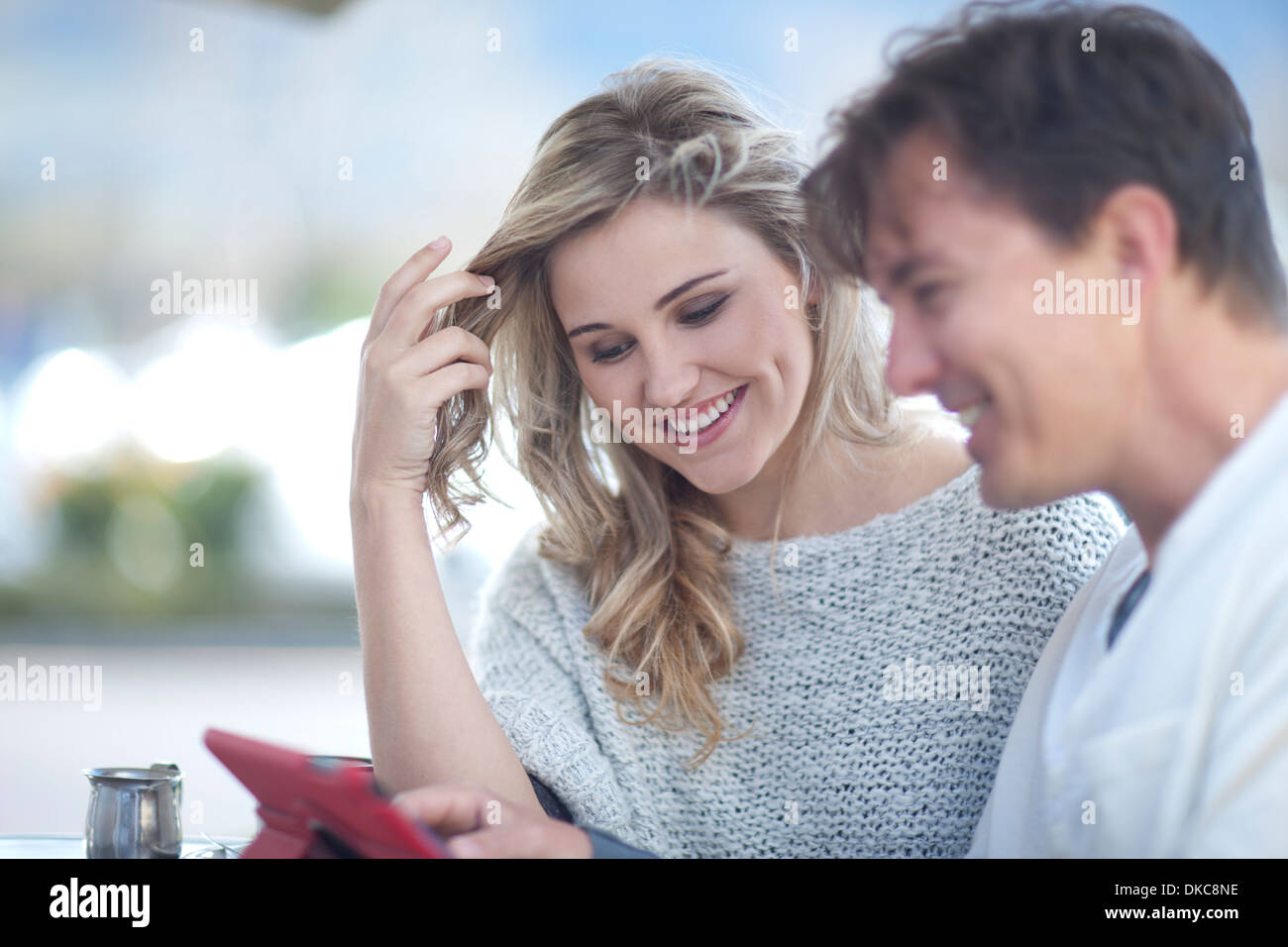 Couple looking at digital tablet Stock Photo