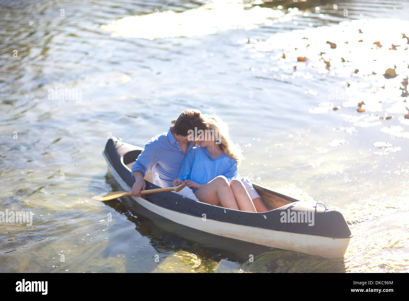 Young romantic couple in rowing boat on river Stock Photo Alamy