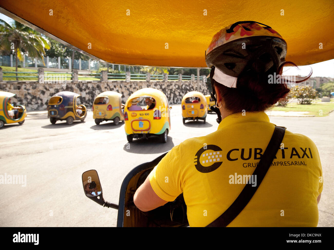 View from inside a coco taxi, of other coco taxis, Havana, Cuba Caribbean Stock Photo