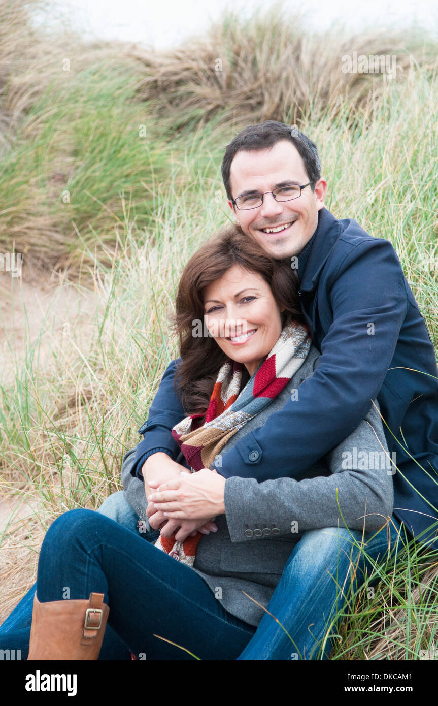 Couple man woman sitting on hi-res stock photography and images - Alamy