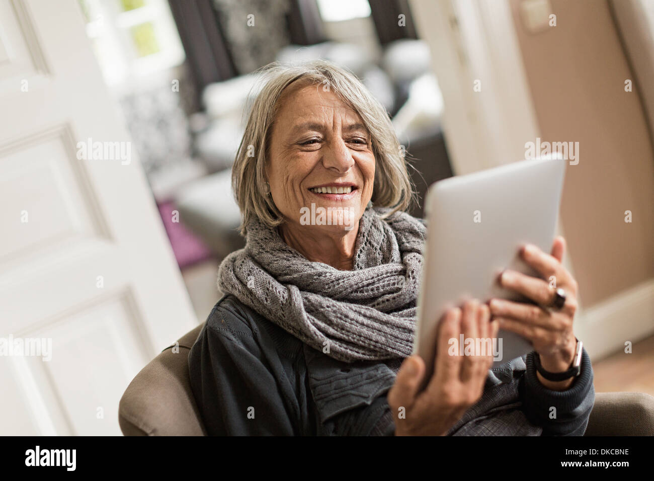 Senior woman with digital tablet Stock Photo
