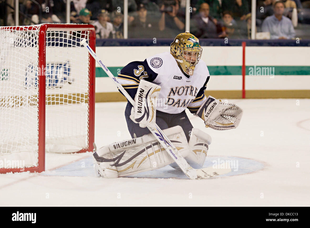Oct. 21, 2011 - South Bend, Indiana, U.S - Notre Dame goaltender Mike Johnson (#32) goes into the butterfly position in first period action of NCAA hockey game between Notre Dame and Rensselaer Polytechnic Institute (RPI).  The Notre Dame Fighting Irish defeated Rensselaer Polytechnic Institute (RPI) Engineers 5-2 in game at the Compton Family Ice Arena in South Bend, Indiana. (Cre Stock Photo
