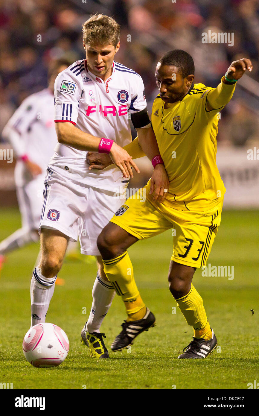 Oct. 22, 2011 - Bridgeview, Illinois, U.S - Chicago Fire midfielder Logan Pause (12) and Columbus Crew forward Jeff Cunningham (33) battle for the ball during second half action of the MLS game between the Chicago Fire and the Columbus Crew at Toyota Park in Bridgeview, IL. The Fire defeated the Crew 3-2. (Credit Image: © Geoffrey Siehr/Southcreek/ZUMAPRESS.com) Stock Photo
