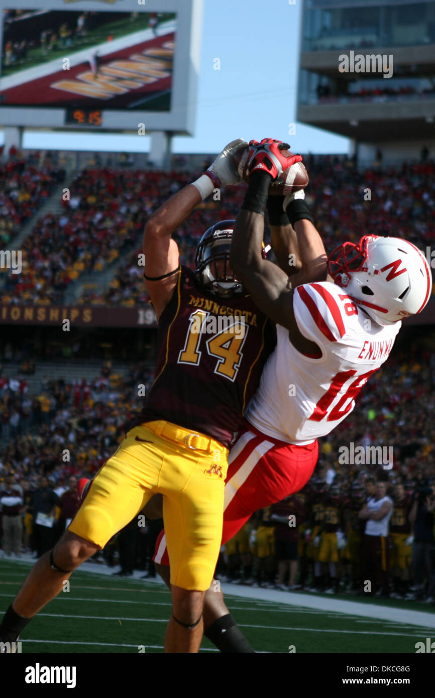 Oct. 22, 2011 - Minneapolis, Minnesota, U.S - University of Minnesota Gophers cornerback Kyle Henderson (14) puts just enough defense on University of Nebraska Cornhuskers wide receiver Quincy Enunwa  (18) to force a miss and a field goal to complete the game's opening drive at the football game between Nebraska and Minnesota at TCF Stadium in Minneapolis, Minnesota. The Cornhusker Stock Photo