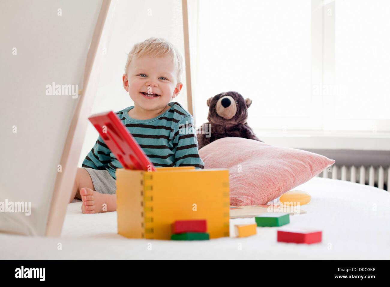 Happy little boy with toys Stock Photo