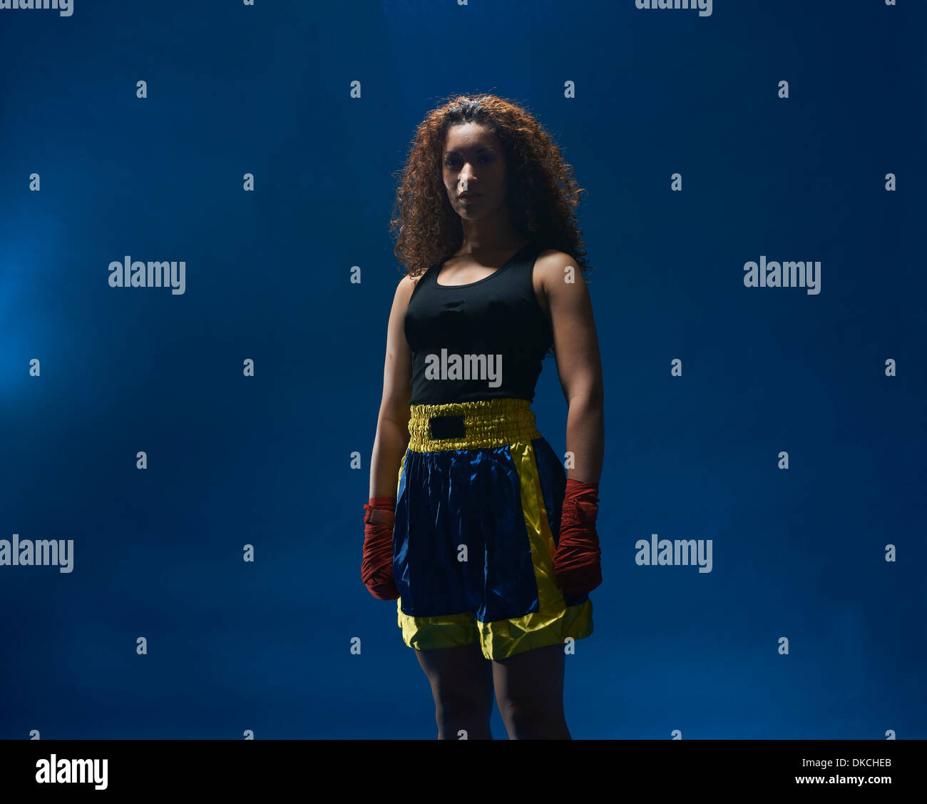 Studio portrait of female boxer in hand bandages Stock Photo