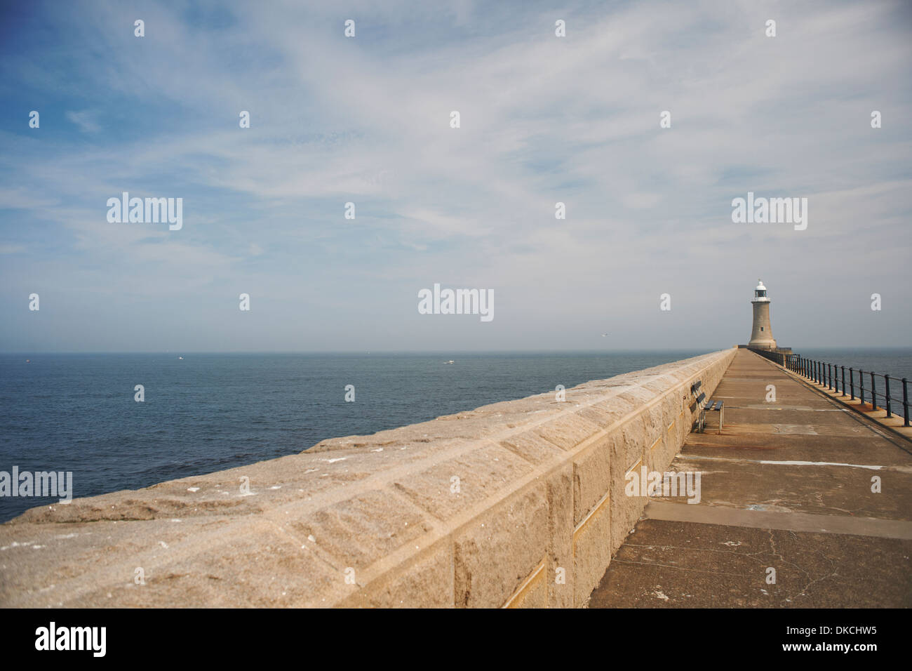 Harbour wall and lighthouse, Tynemouth, Tyne and Wear, United Kingdom Stock Photo