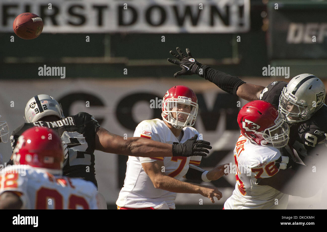 In this Sept. 20, 2009, photo, Oakland Raiders defensive end Greg Ellis  (99) sacks Kansas City Chiefs quarterback Matt Cassel (7) during the fourth  quarter of a NFL football game in Kansas