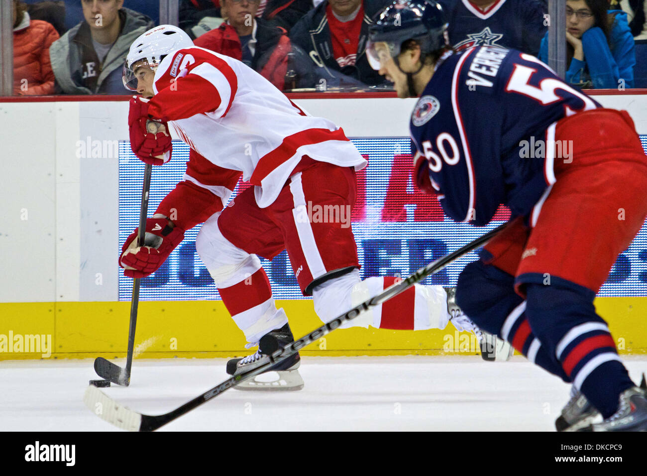 Oct. 25, 2011 - Columbus, Ohio, U.S - Detroit Red Wings defenseman Brad Stuart (23) moves the puck away from Columbus Blue Jackets center Antoine Vermette (50) in the first period of the game between Detroit Red Wings and Columbus Blue Jackets at Nationwide Arena, Columbus, Ohio. (Credit Image: © Scott Stuart/Southcreek/ZUMAPRESS.com) Stock Photo