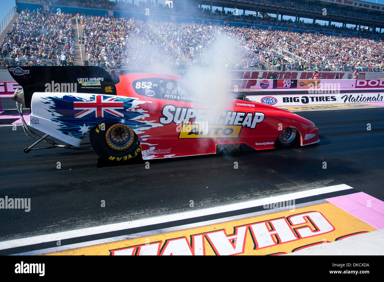 Oct. 29, 2011 - Las Vegas, Nevada, U.S - NHRA Funny Car driver Peter Russo  of the Super Cheap Auto Chevrolet Monte Carlo goes up in smoke when leaving  the line during, image size:1300x956