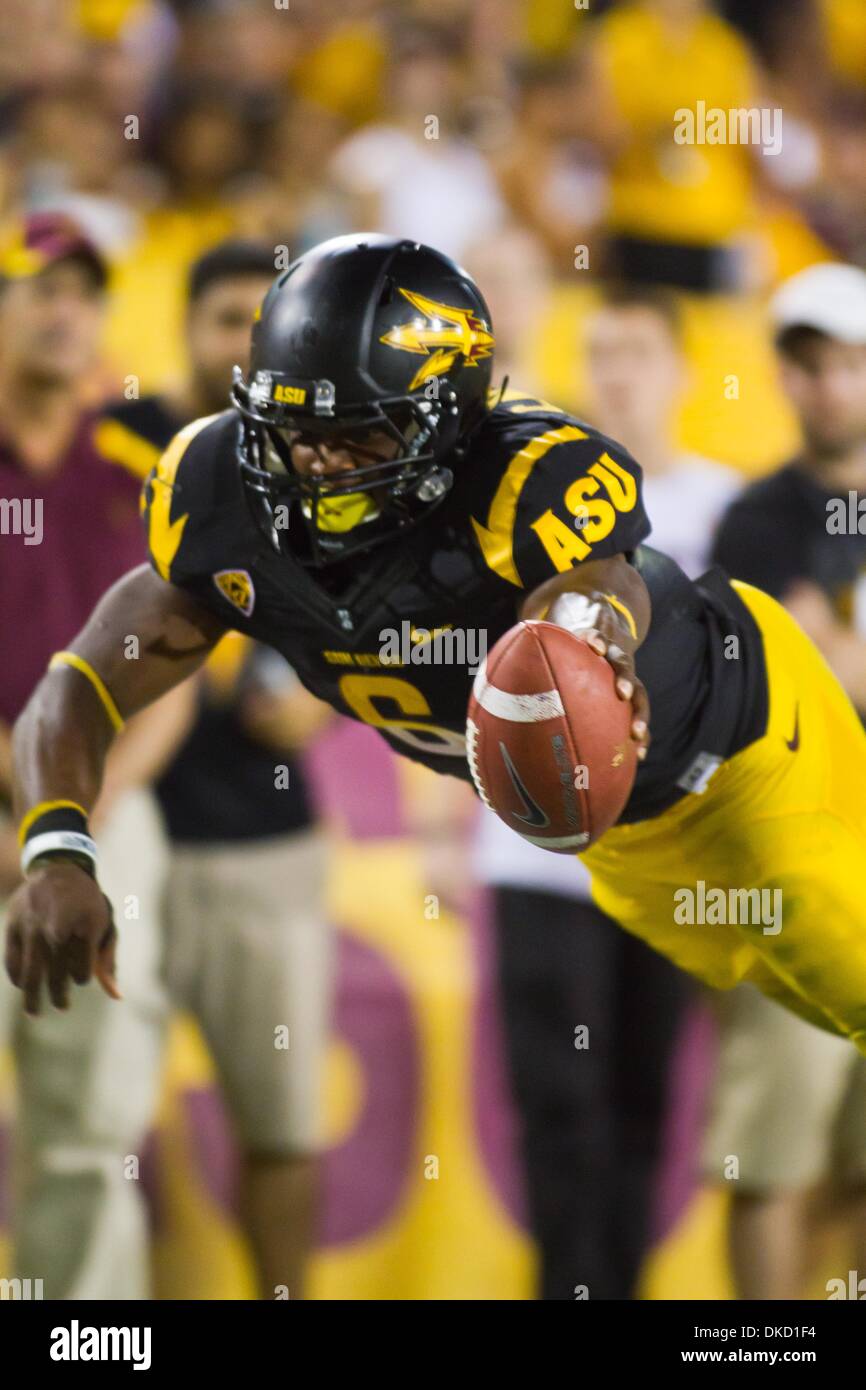 Oct. 29, 2011 - Tempe, Arizona, U.S. - RB Cameron Marshall (6) takes flight into the endzone as part of his 114 yrd rushing day . Arizona State handed Colorado their eighth loss of the season in the Pac 12 Showdown in Tempe Arizona. (Credit Image: © Dean Henthorn/Southcreek/ZUMAPRESS.com) Stock Photo