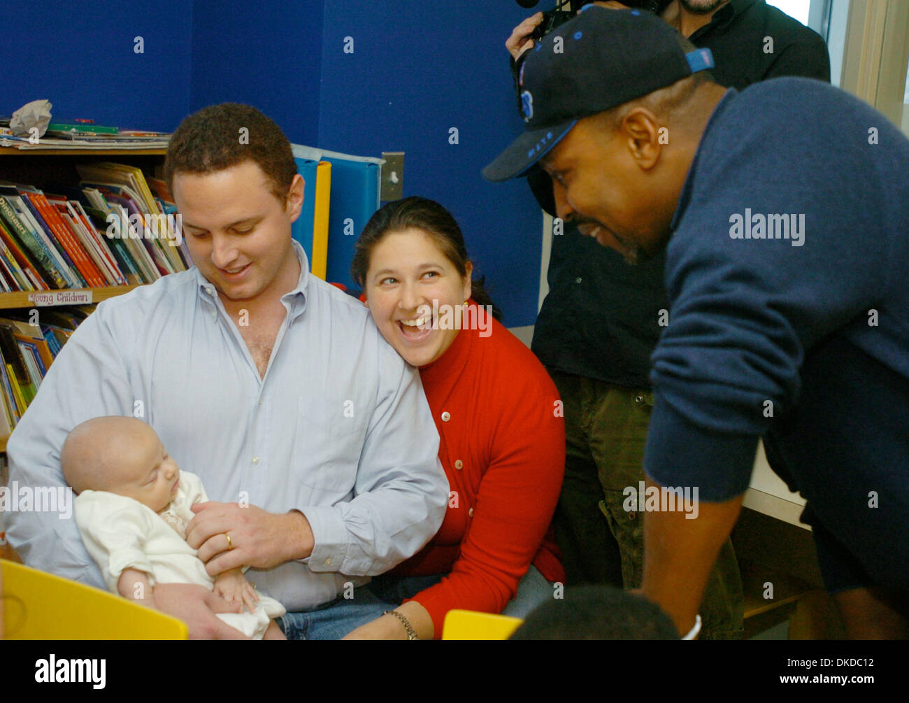 Dec 11, 2006; New York, NY, USA; NY Mets manager WILLIE RANDOLPH (R) greets Jonathan and Loren holding their son Sean, 6 weeks old as he spreads holiday cheer to pediatric patients at the Kominsky Center for Children's Health at NewYork-Presbyterian/Weill Cornell.  Mandatory Credit: Photo by Bryan Smith/ZUMA Press. (©) Copyright 2006 by Bryan Smith Stock Photo