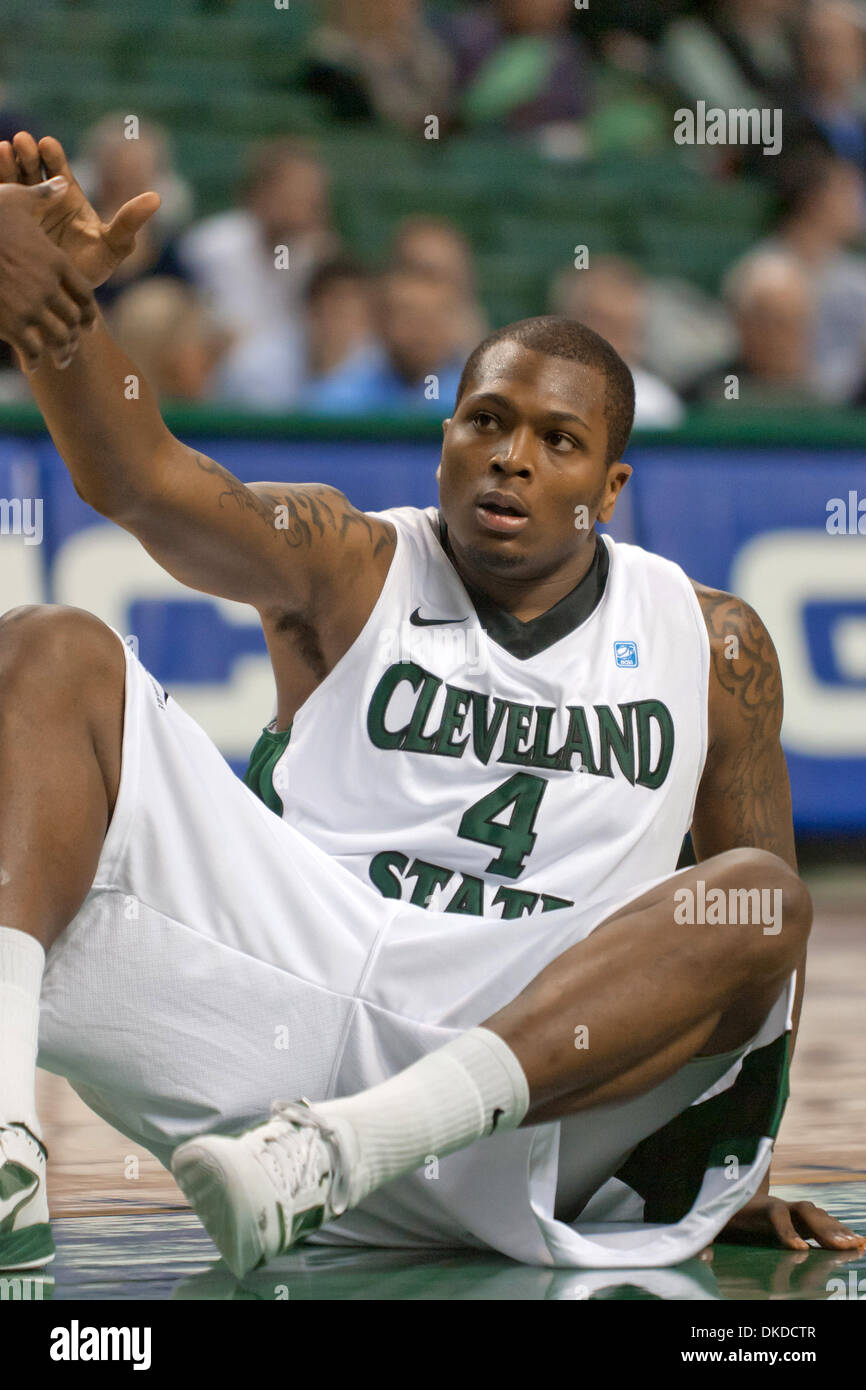 Nov. 9, 2011 - Cleveland, Ohio, U.S - Cleveland State forward Devon Long (4) is helped to his feet after being fouled during the first half against John Carroll.  The Cleveland State Vikings defeated the John Carroll Blue Streaks 88-58 in the game played at the Wolstein Center in Cleveland, Ohio. (Credit Image: © Frank Jansky/Southcreek/ZUMAPRESS.com) Stock Photo