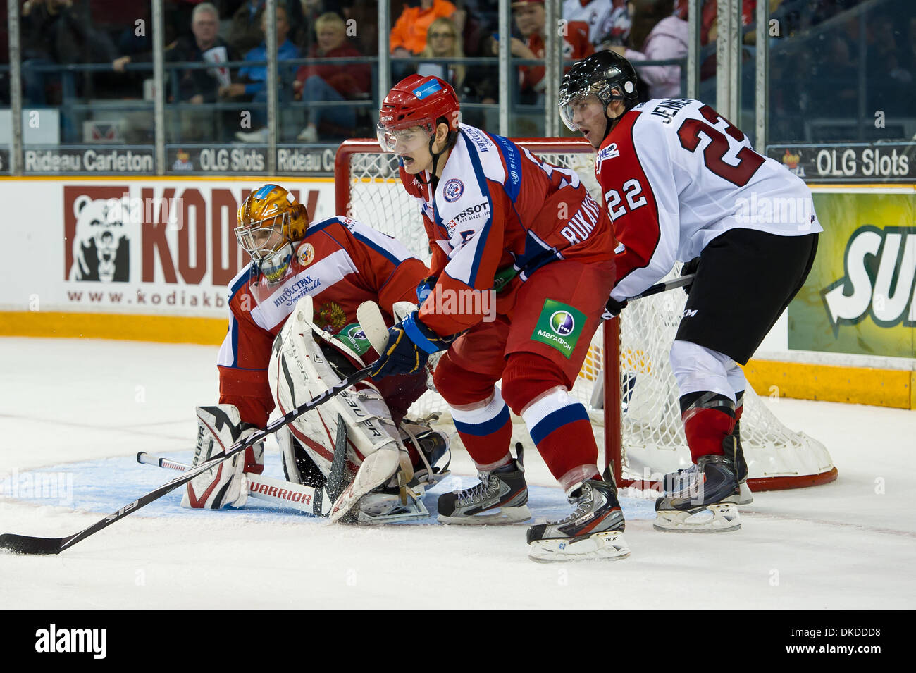 Nov. 10, 2011 - Ottawa, Ontario, Canada - Team Russia goalie Sergey Kostenko (1) and defenseman Roman Rukavishnikov (5) protect the net while OHL All Stars forward Boone Jenner (22)stands behind them in the third period at the J. Benson Cartage Centre in Ottawa, ON, CAN. The OHL All Stars defeated Team Russia by a score of 10-7. The Subway Super Series enables the CHL's top players Stock Photo