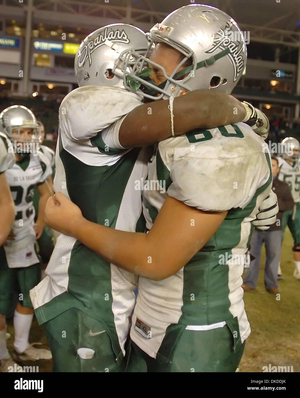 Dec 16, 2006; Carson, CA, USA; De La Salle's PAUL WRIGHT, #16, consoles teammate ALBERT SIU, #60, after their lost to Canyon during the California Interscholastic Federation State Football Championship Bowl Game Division One on Saturday, December 16, 2006 at the Home Depot Center in Carson, Calif. Canyon defeated De La Salle 27-13. Mandatory Credit: Photo by Jose Carlos Fajardo/Con Stock Photo