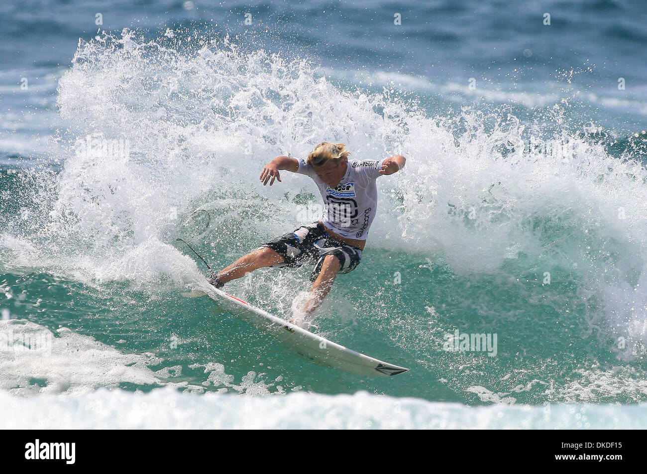 Jan 03, 2007 - North Narrabeen, NSW, AUSTRALIA - Hawaiian DUSTY PAYNE (pictured) used the bit of sunshine that managed to peak through to charge his batteries for round two of the Billabong World Junior Championships held at North Narrabeen, Sydney, Australia today.  The girls were the first to hit the water in the morning allowing the boys to surf later in slightly improved condit Stock Photo