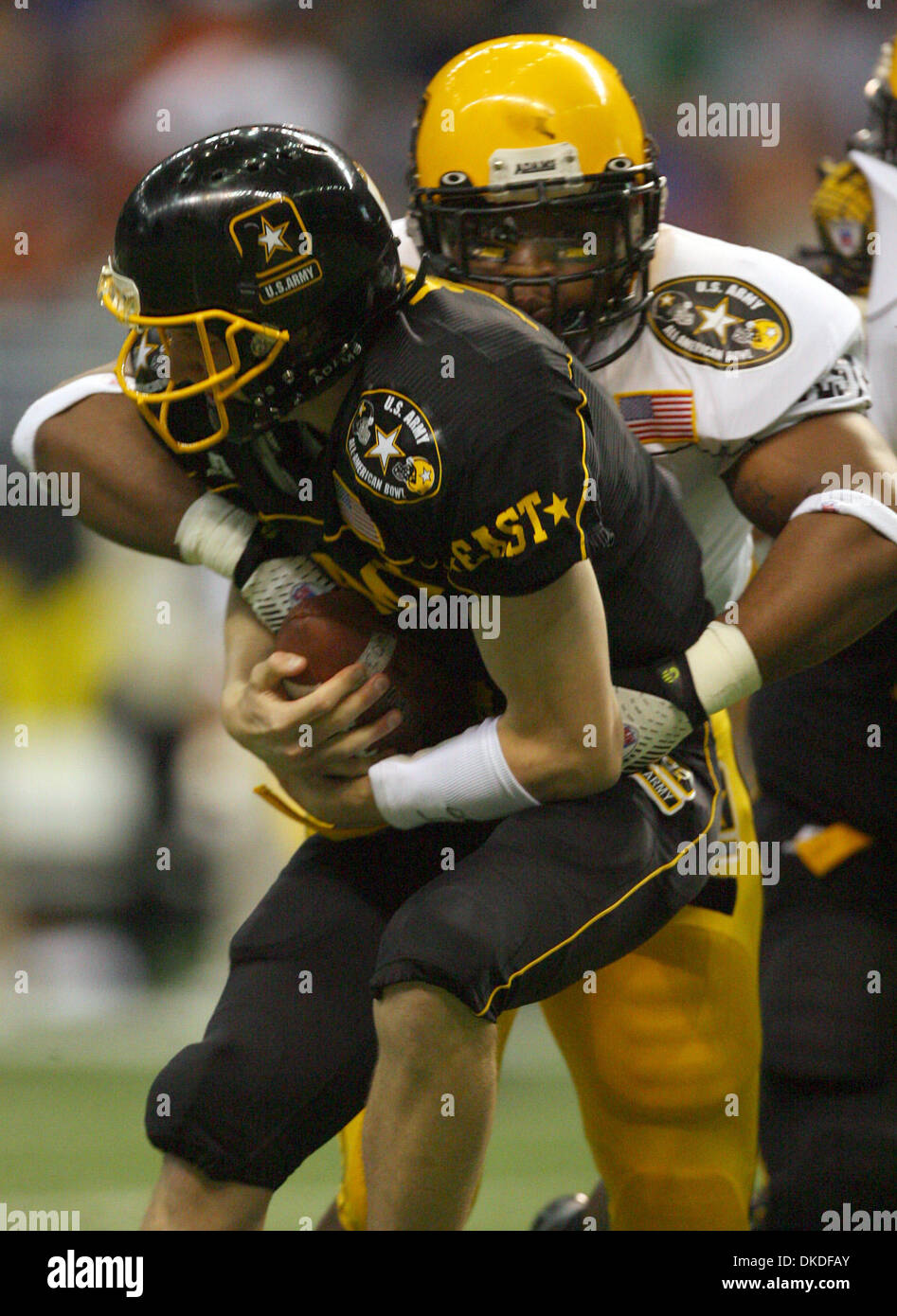 Jan 06, 2007 - San Antonio, TX, USA - 2007 US Army All-American Bowl. East squad's MATT SIMMS is sacked by West squad's EVERSON GRIFFIN Saturday Jan. 6, 2007 at the Alamodome. The West squad went on to win 24-7. Stock Photo