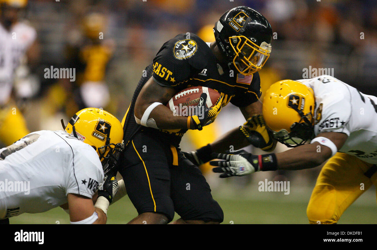 Jan 06, 2007 - San Antonio, TX, USA - 2007 US Army All-American Bowl. East squad's ARRELIOUS BENN is tackled by West squad's CHRIS GALLIPO (left) and CHRISTIAN SCOTT Saturday Jan. 6, 2007 at the Alamodome. The West squad went on to win 24-7. Stock Photo