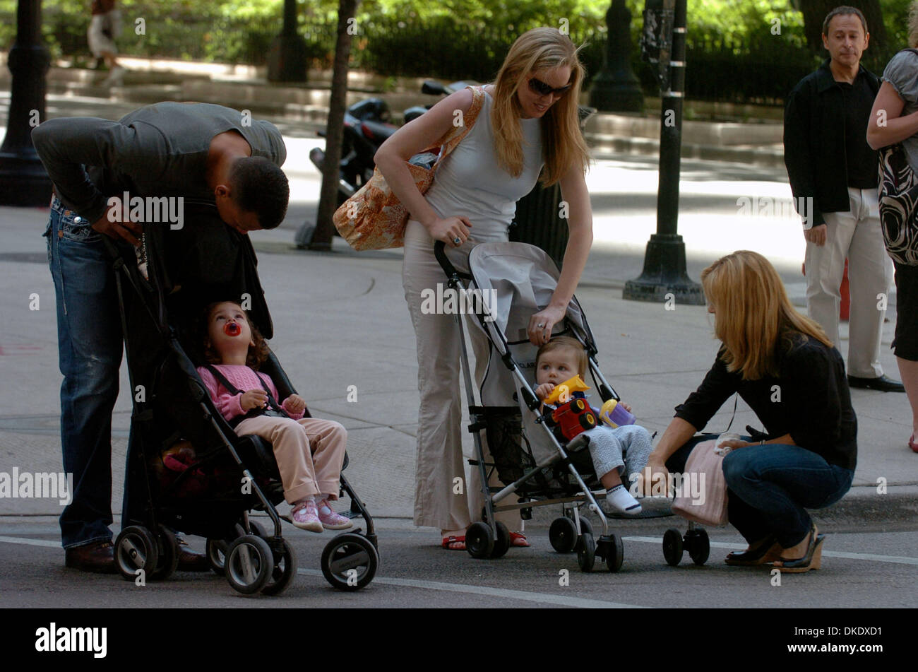 Jun 06, 2007 - Chicago, IL, USA - ALEX RODRIGUEZ speaks with his daughter Natasha (L) while CYNTHIA RODRIGUEZ (R) speaks to an unidentified friends child while out in Chicago. Alex Rodriguez spent the afternoon having lunch and coffee with his family as rumors of an alleged affair with a blond stripper splashed across the headlines last week.  (Credit Image: © Bryan Smith/ZUMA Pres Stock Photo