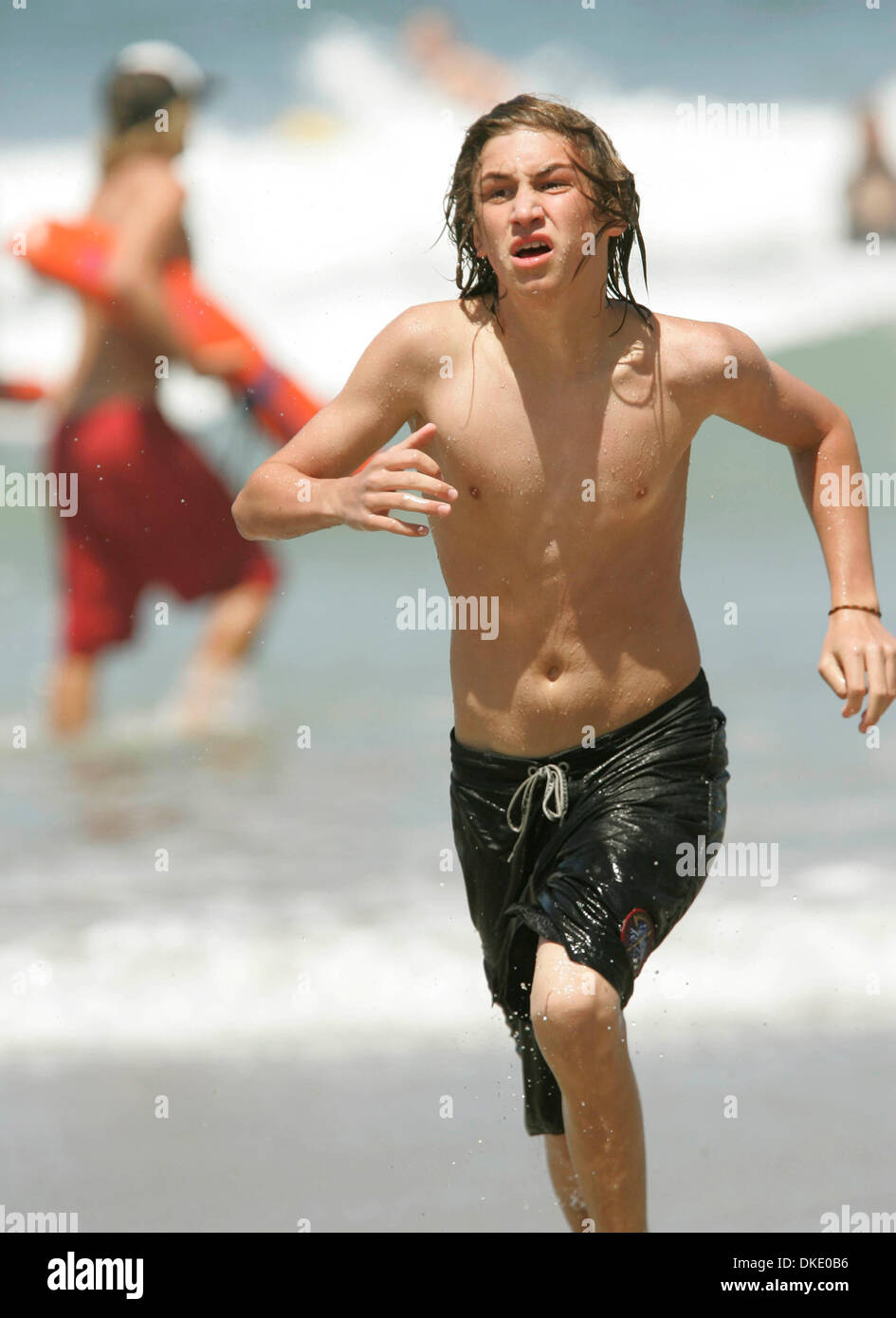 Jun 19, 2007 - Encinitas, California, USA - MASON LEVY, (13-from Carlsbad)  raced from the water during a relay race at Moonlight Beach in Encinitas He  was one of the kids taking