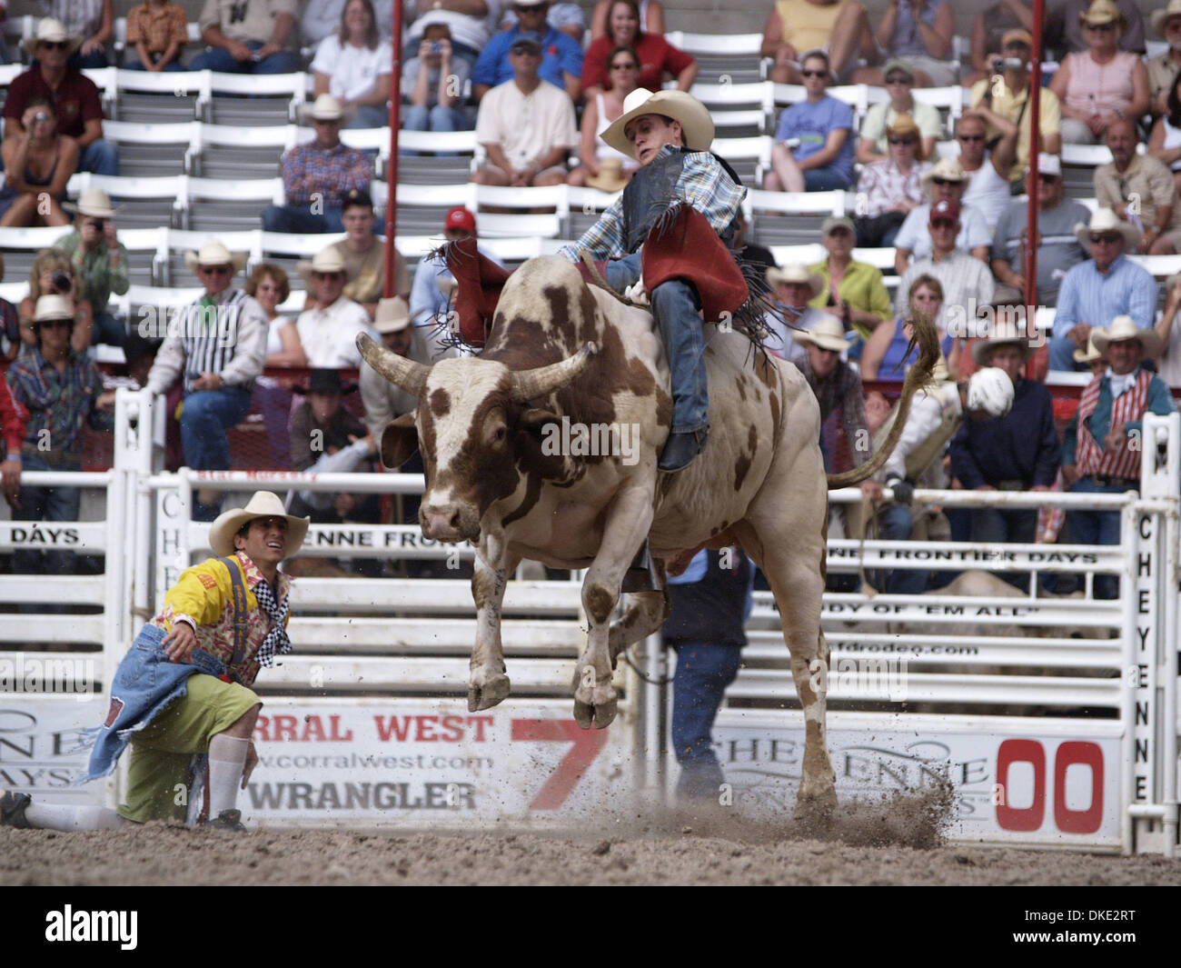 Jul 23, 2007 - Cheyenne, WY, USA - The Cheyenne Frontier Days Rodeo, called the 'Daddy of 'em All,' is the world's largest outdoor rodeo with approximately 1,800 contestants and the regular season's largest total purse whic is expected to reach USD 1,000,000. Pictured: JIMMY CROSBY of Azle, Texas competes in the Bull Riding event. (Credit Image: © Don Senia Murray/ZUMA Press) Stock Photo