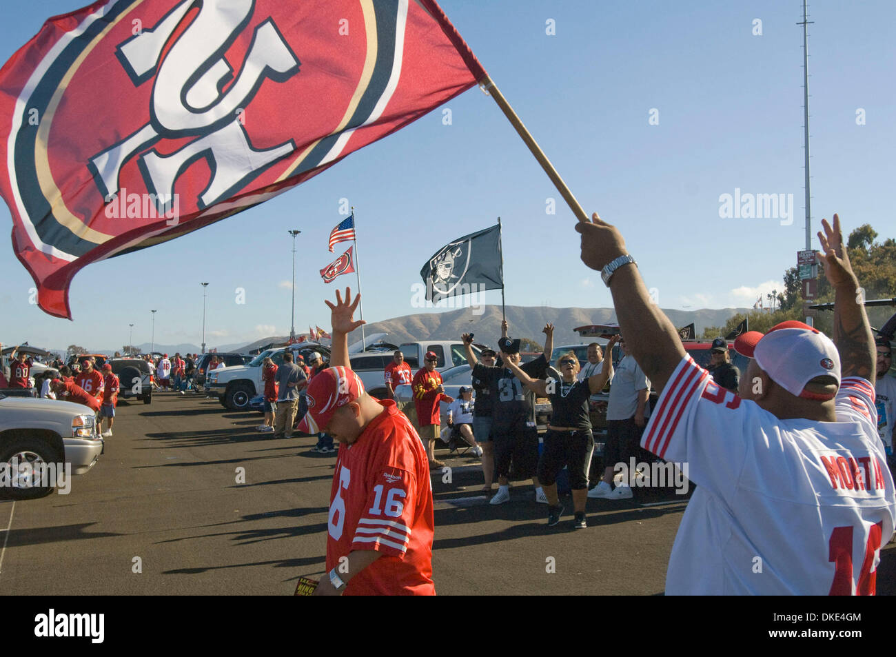 Aug.18, 2007 - San Francisco, California, U.S. - San Francisco 49ers vs Oakland Raiders at Bill Walsh field. Tailgate activities in parking lot before game.  Taunting each other with words and flag bay are fans are vocal. (Credit: © Al Golub/ZUMApress.com) Stock Photo