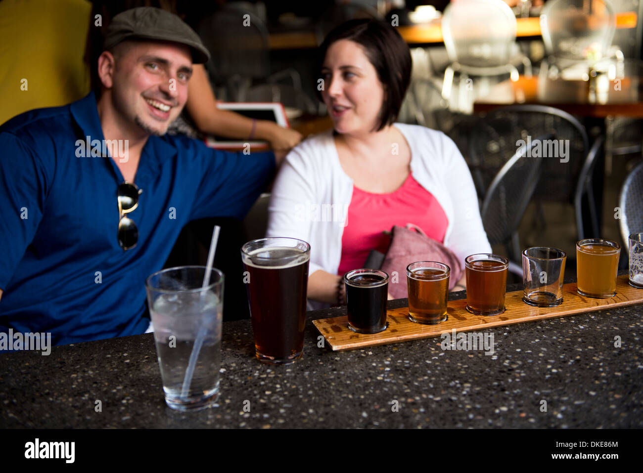 Patrons at the Asheville Lexington Avenue Brewery (Lab) drinking beer in Asheville, North Carolina Stock Photo