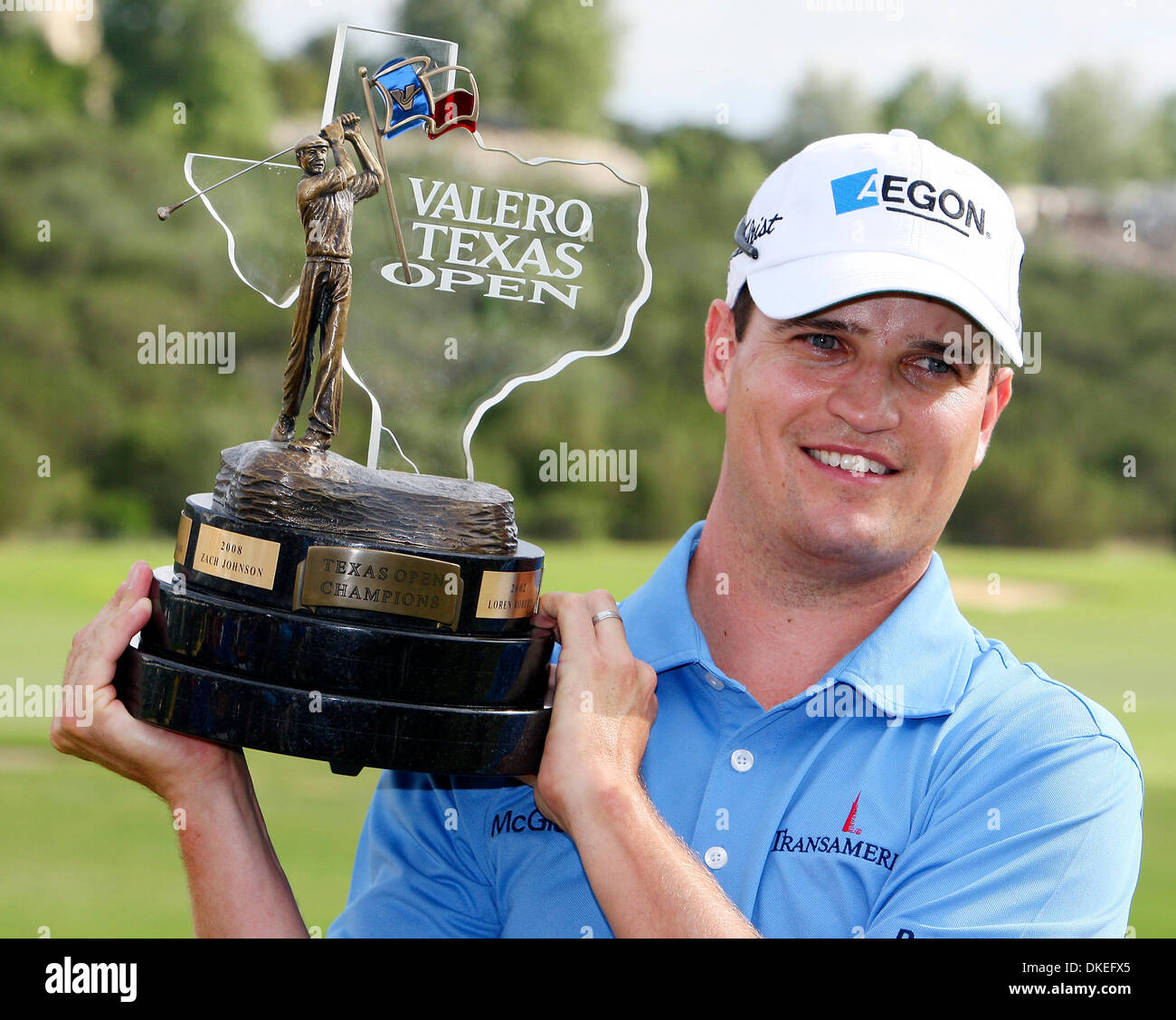 FOR METRO Zach Johnson poses with the trophy after winning the Valero
