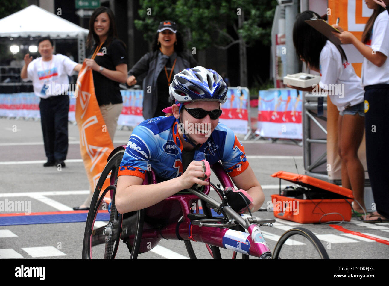 May 25, 2009 - Los Angeles, California, USA - Wheelchair racer, AMANDA MCGRORY, of Savoy, Indiana, crosses the finish line and places third overall in the wheelchair race at the 24th Annual Los Angeles Marathon.   McGRORY had a time of 1:48:13 and averaged 4:07:07 per mile over the 26.2 mile course.  (Credit Image: © Scott Mitchell/ZUMA Press) Stock Photo