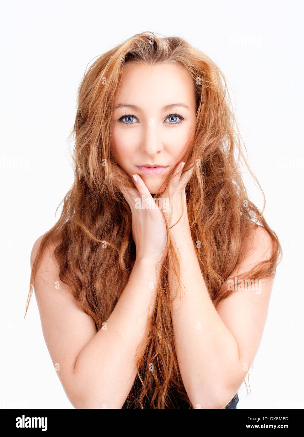 Portrait of a Young Girl with Long Brown Hair and Blue Eyes Stock Photo