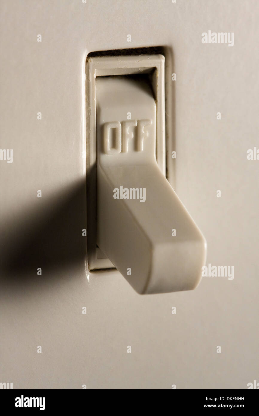 Closeup of a light switch in the 'OFF' position Stock Photo