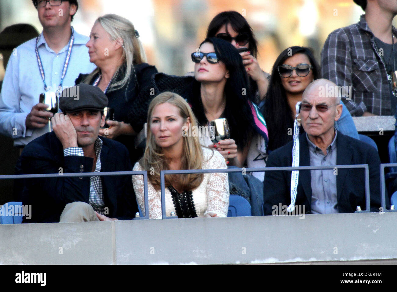 Jon Hamm and Jennifer Westfeldt and Sir Patrick Stewart at 2012 U.S Open to watch Men's Final match between Andy Murray and Stock Photo