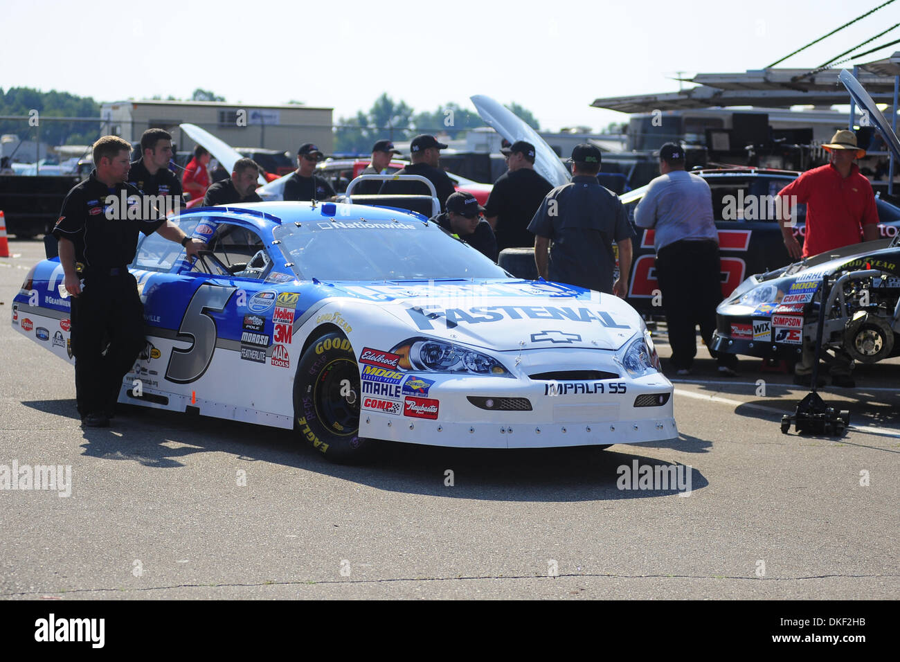 14 August 2009 The crew of Ryan Newman's Fastenal Chevy push the car