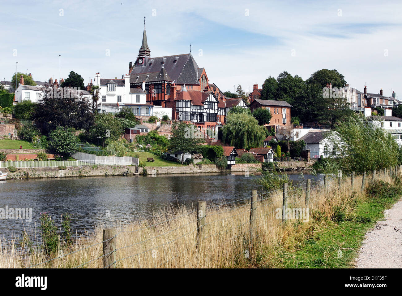 The River Dee at Chester, England,showing riverside properties with waterfront gardens. Stock Photo