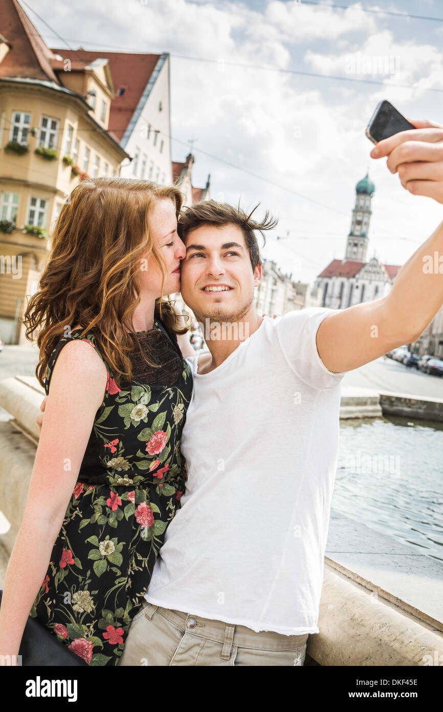Young couple taking self portrait photograph Stock Photo