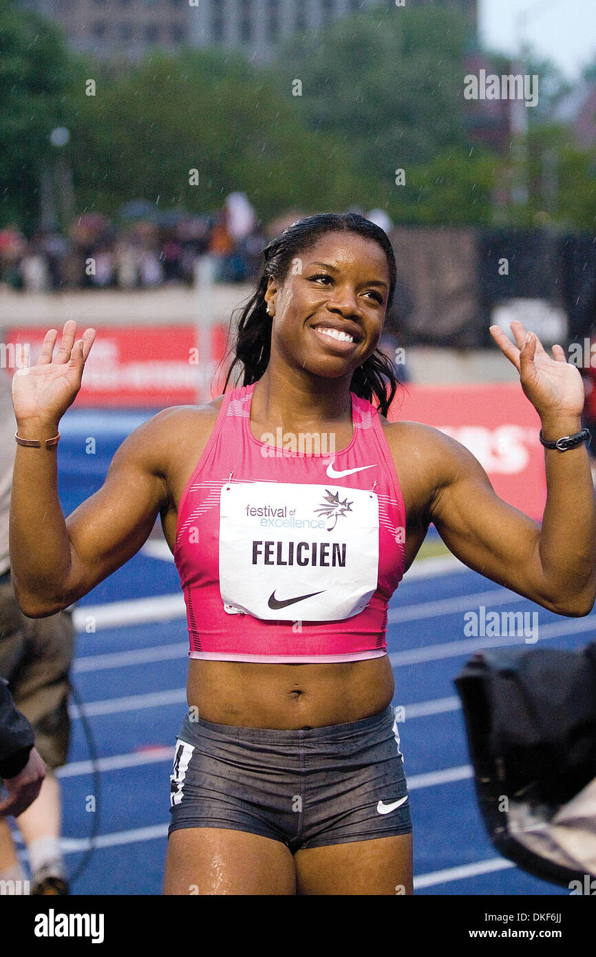 Jun 11, 2009 - Toronto, Ontario, Canada - PERDITA FELICIEN of Canada was out gunned by fellow teammate Lopes-Schleip in the Women's 100 Meter Hurdles at University of Toronto's Festival of Excellence. Lopes-Schleip completed her sprint at a time of 12.86 beating Felicien by a margin of 2 one-hundredths of a second. (Credit Image: © Terry Ting/Southcreek EMI/ZUMA Press) Stock Photo