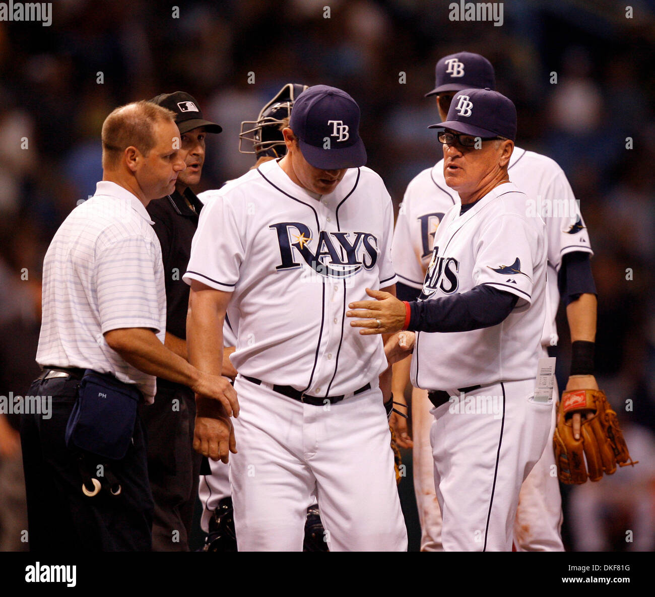 DIRK SHADD   |   Times.SP 305661 SHAD RAYS 17 (06/13/2009 St. Petersburg) Tampa Bay Rays pitcher Jason Isringhausen gets attention from manager Joe Maddon and the medical staff as he appeared to suffer an injury pitching in the top of the ninth inning against Washington Nationals at Tropicana Field in St. Petersburg Saturday evening (06/13/09).  [DIRK SHADD, Times] (Credit Image: © Stock Photo