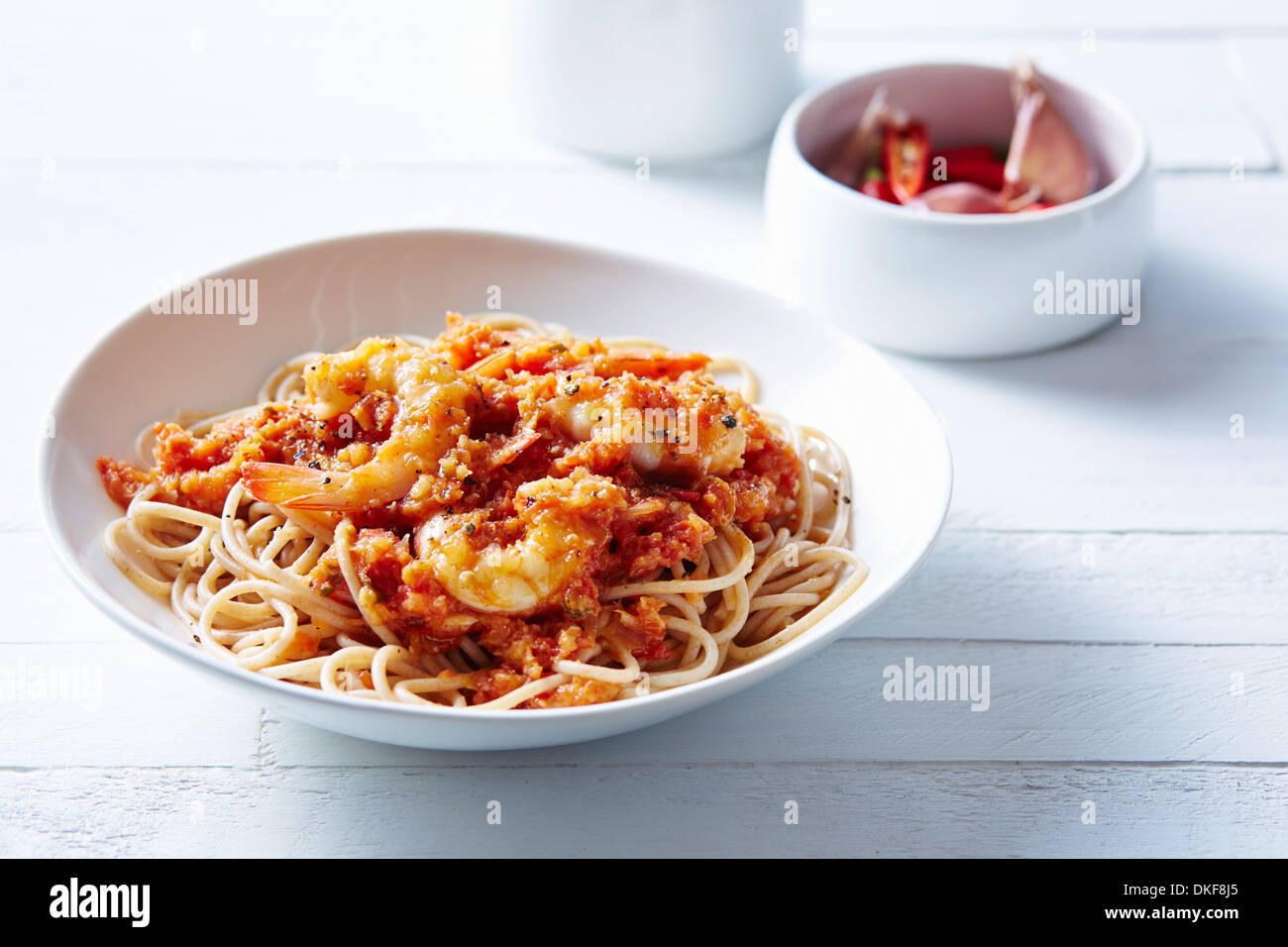 Still life of spaghetti with asian prawns Stock Photo