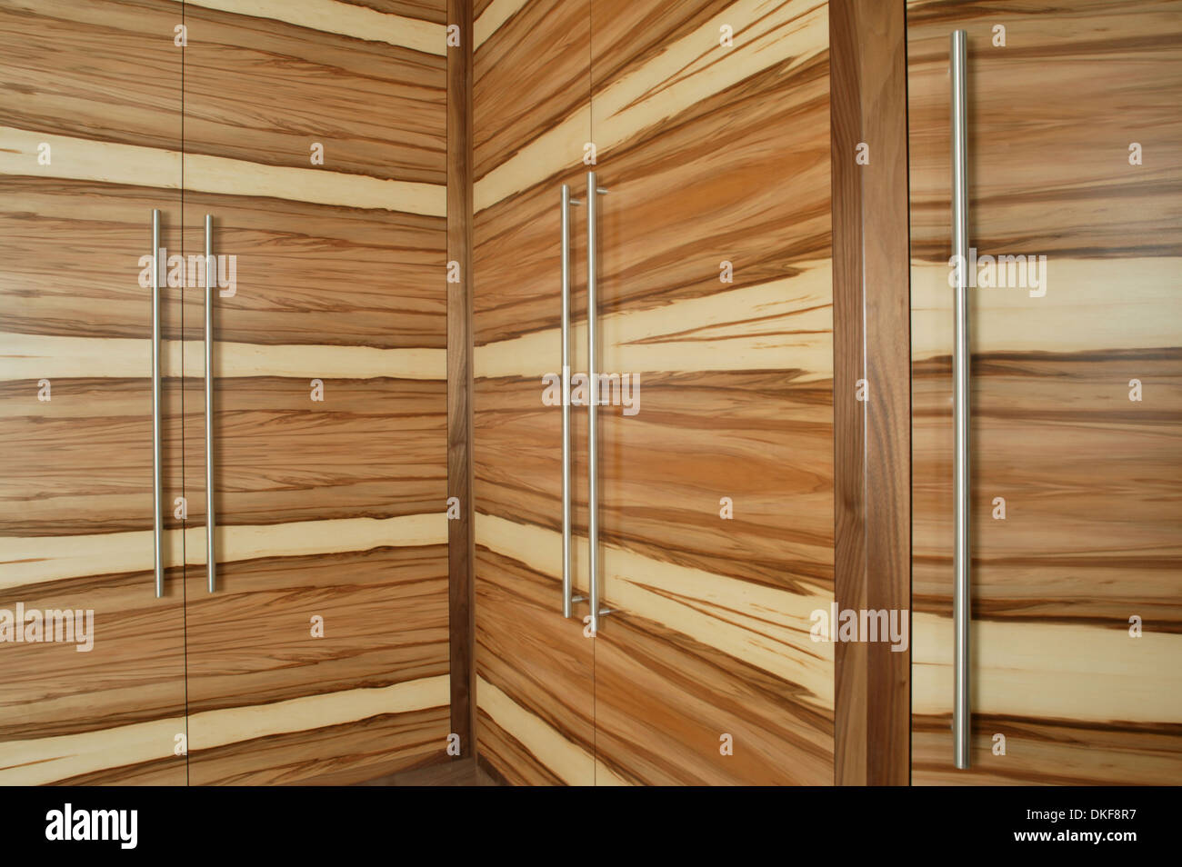 Abstract photograph of triple wardrobe in striped wood Stock Photo