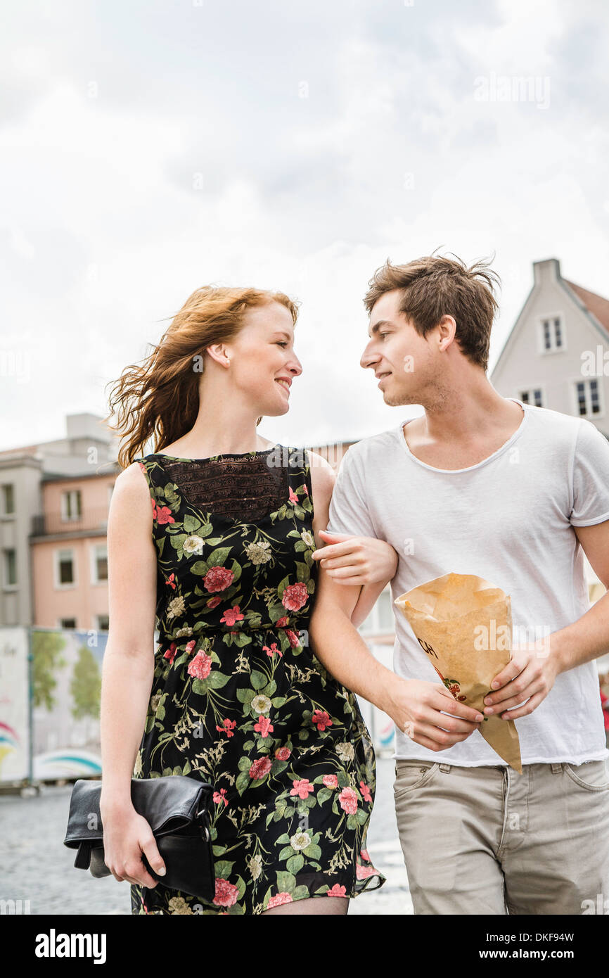 Young Couple Walking Through Town Arm In Arm Stock Photo Alamy Young Couple Walking Through Town Arm In Arm Stock Photo Alamy