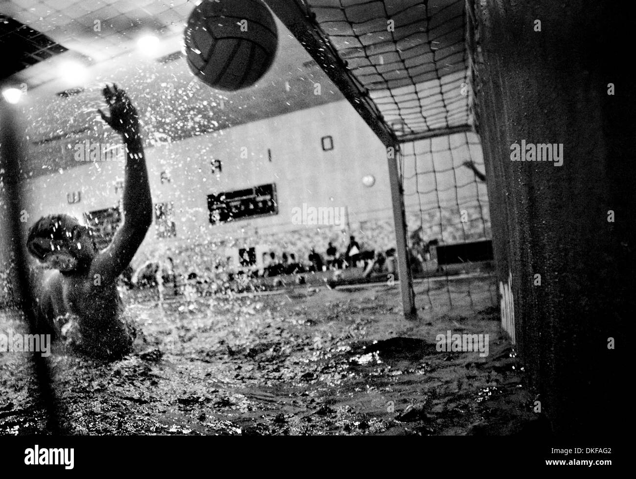 Jun 18, 2009 - Torrance, California, USA - Beverly Hills high school water polo goalie GIANNI CANTU spashes water into the air as he dives to try for a save, but misses blocking a shot, allowing a point by Palos Verdes high school offense during a summer league water polo match inside the aquatics center at El Camino Community College on Thursday June 18, 2009. (Credit Image: © Pat Stock Photo