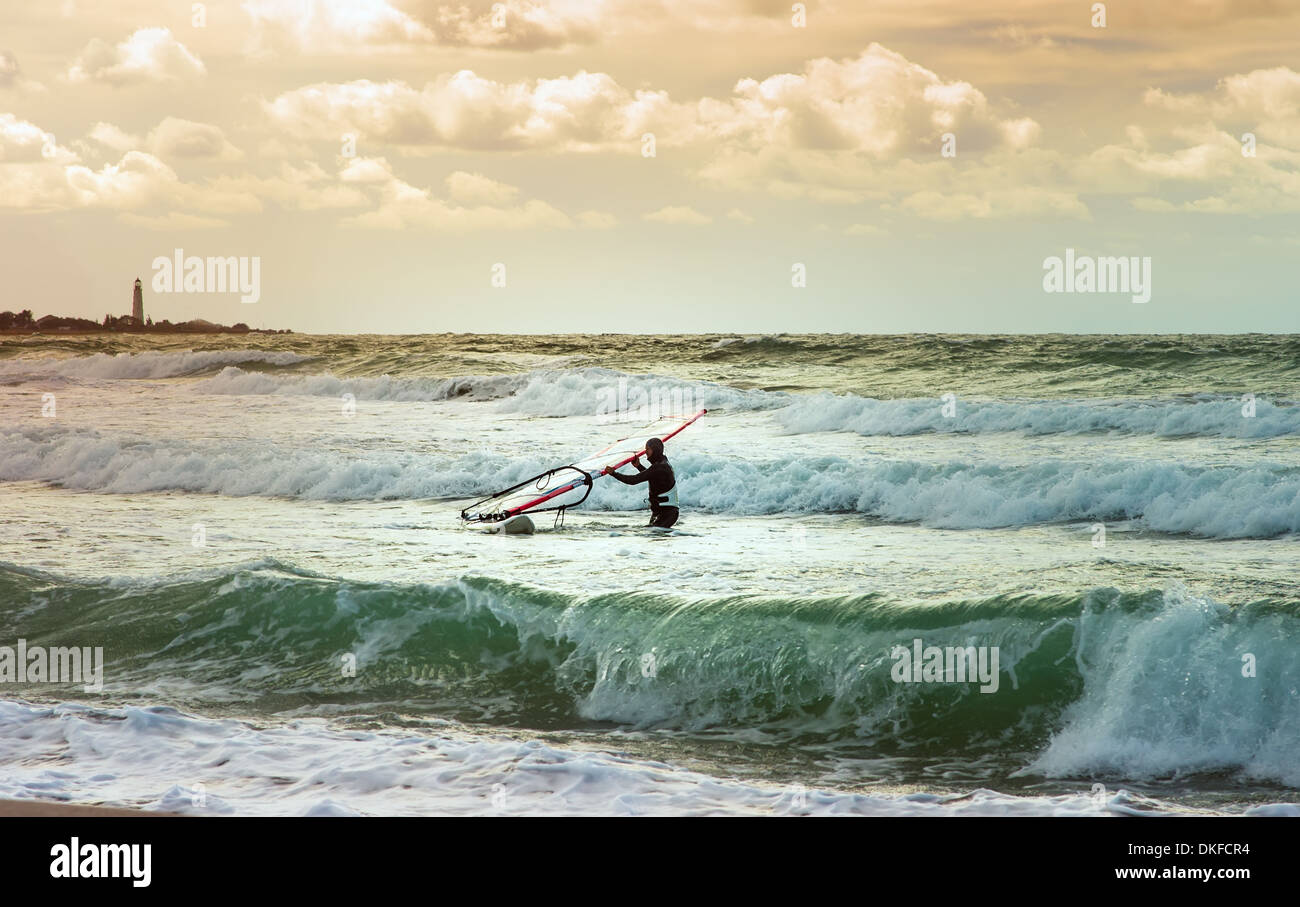 Sea Windsurfing Sport sailing water active leisure Windsurfer training on waves summer day Lifestyle concept Stock Photo