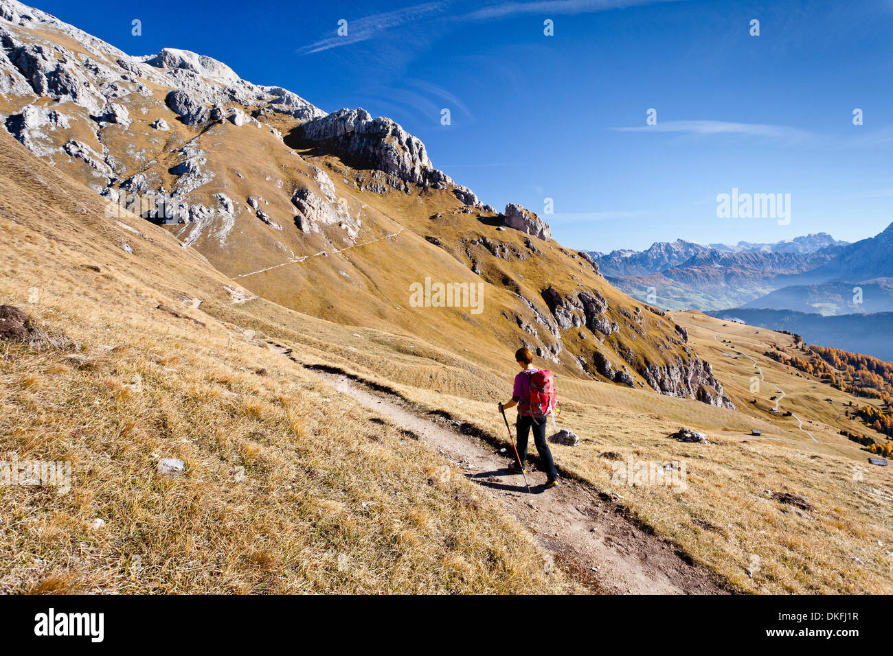 Mountain climber on the DolomitenHöhenweg mountain trail while