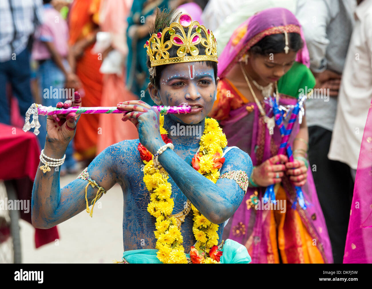 Indian boy dressed as Krishna at a festival in the streets of Puttaparthi. Andhra Pradesh, India Stock Photo