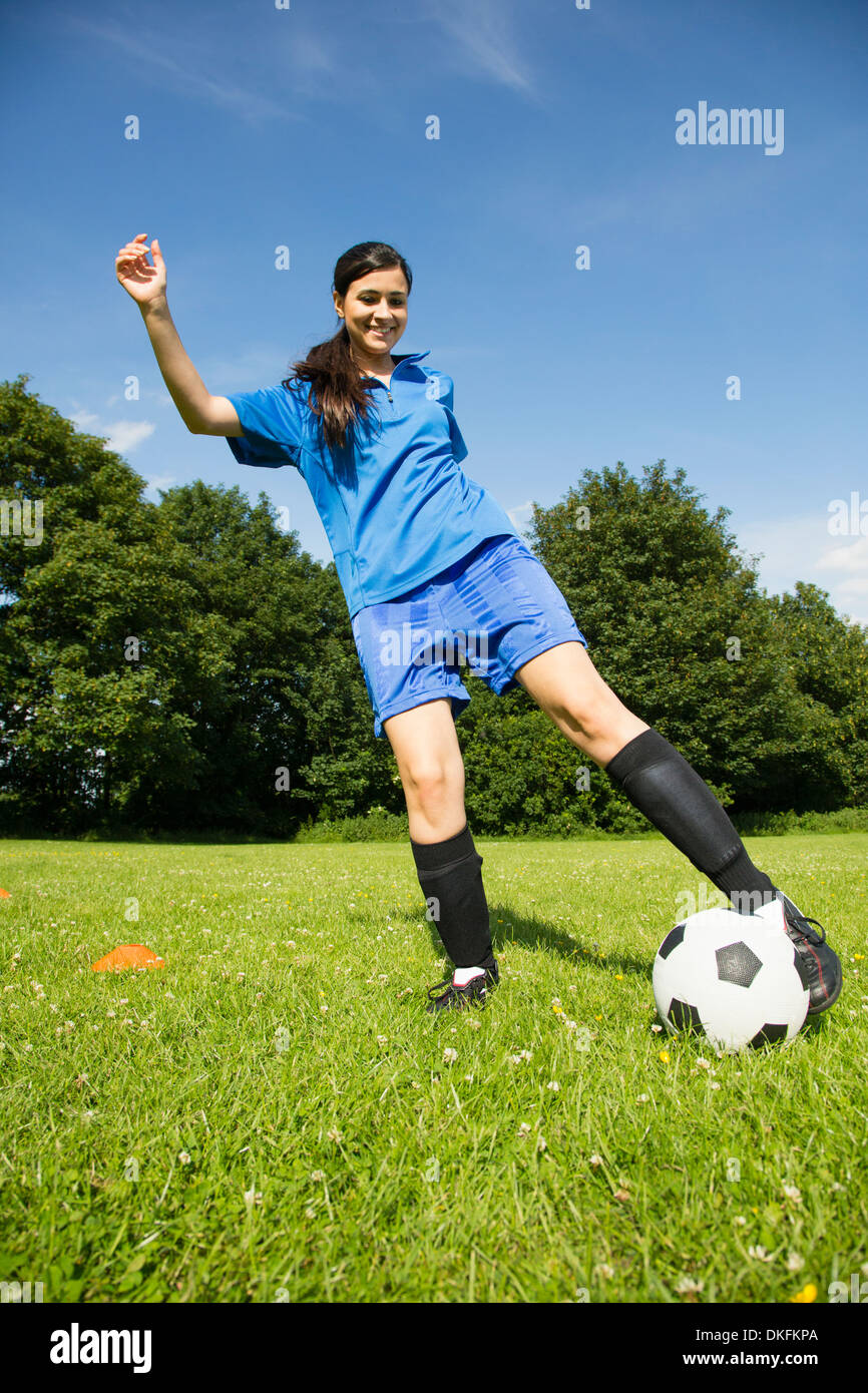 Woman playing soccer Stock Photo Alamy