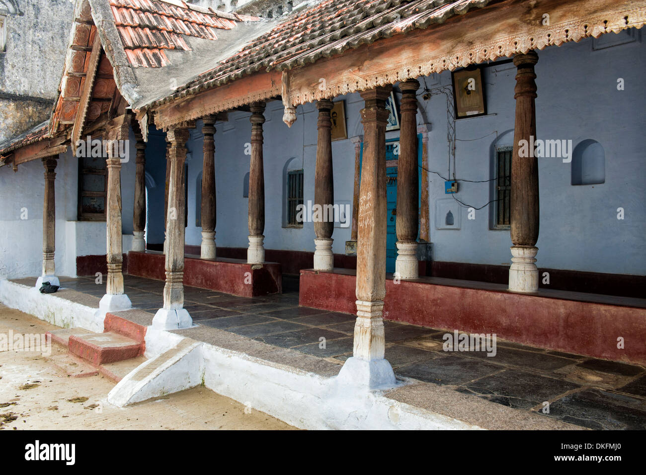 Traditional south indian house with large wooden pillared veranda. Andhra Pradesh, India Stock Photo